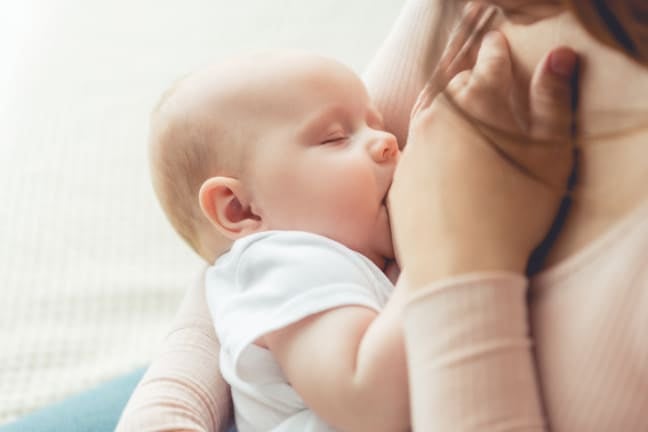 Mother breastfeeding baby